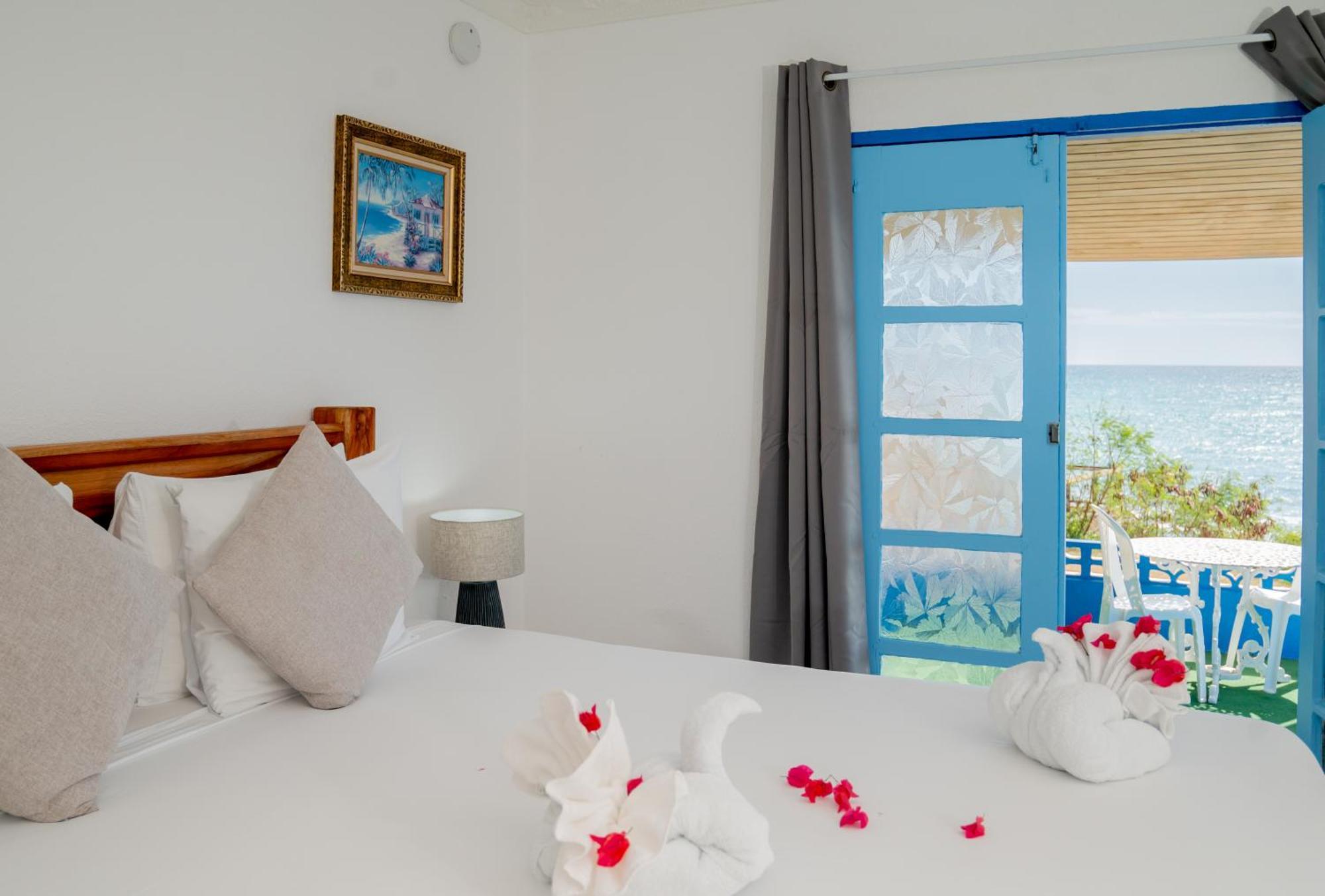 Beyond Sunset Resort & Villas トレジャー・ビーチ エクステリア 写真